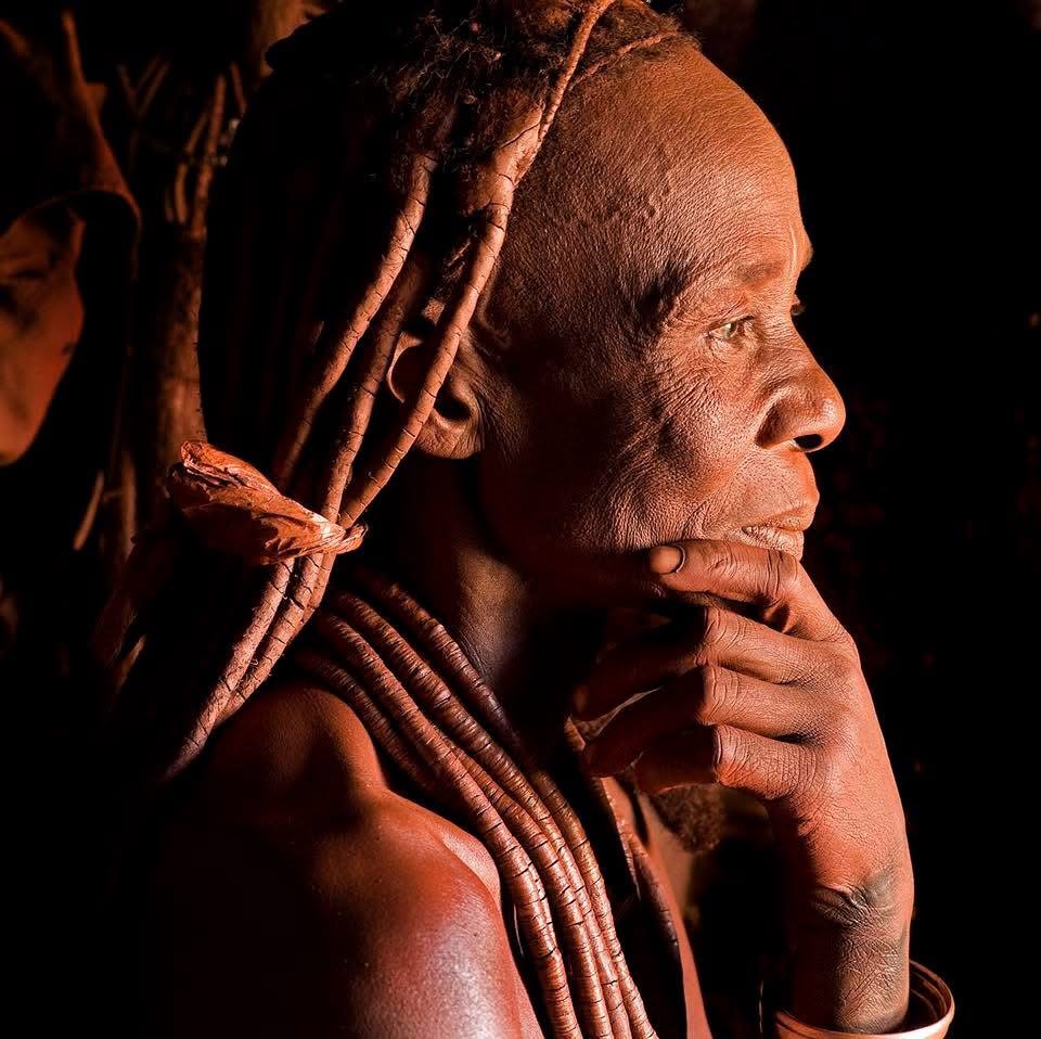 Portrait of a Himba woman with ochre-coloured hair