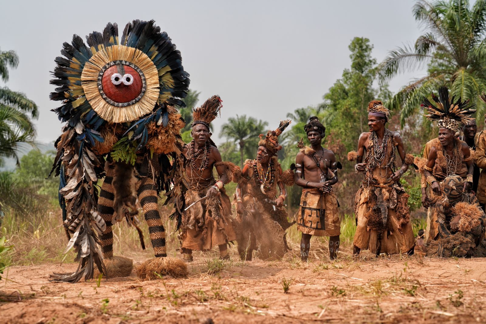 Masked dancers at a village ceremony