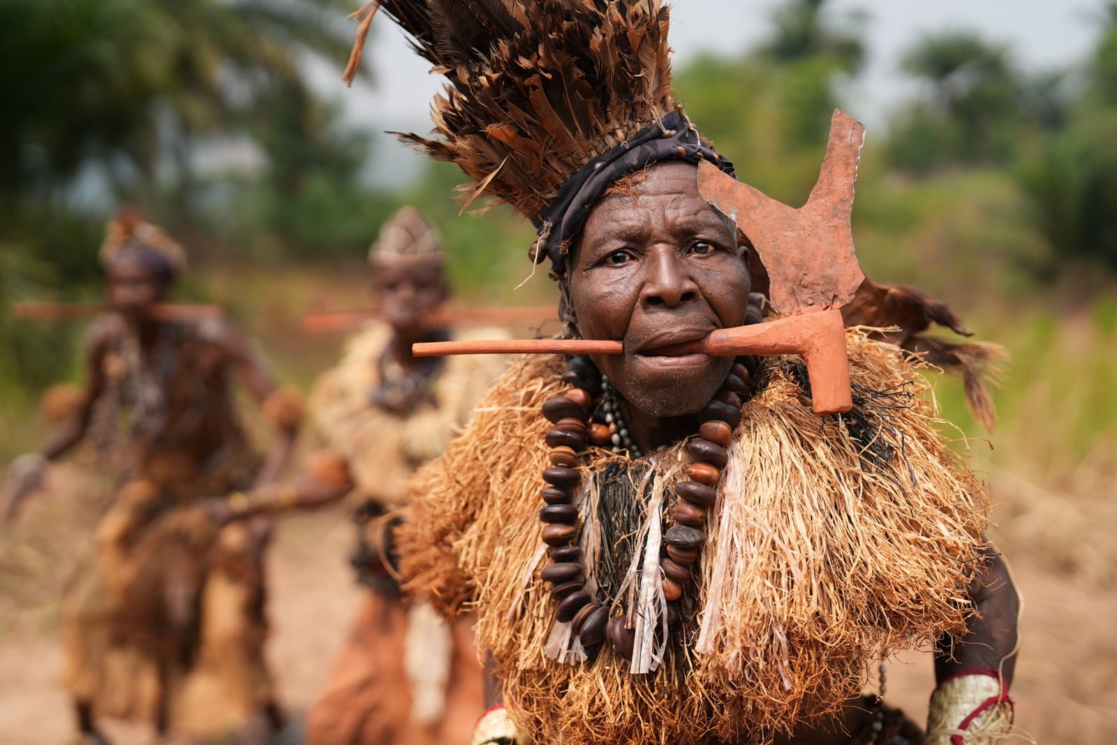 Dancers in raffia and beads