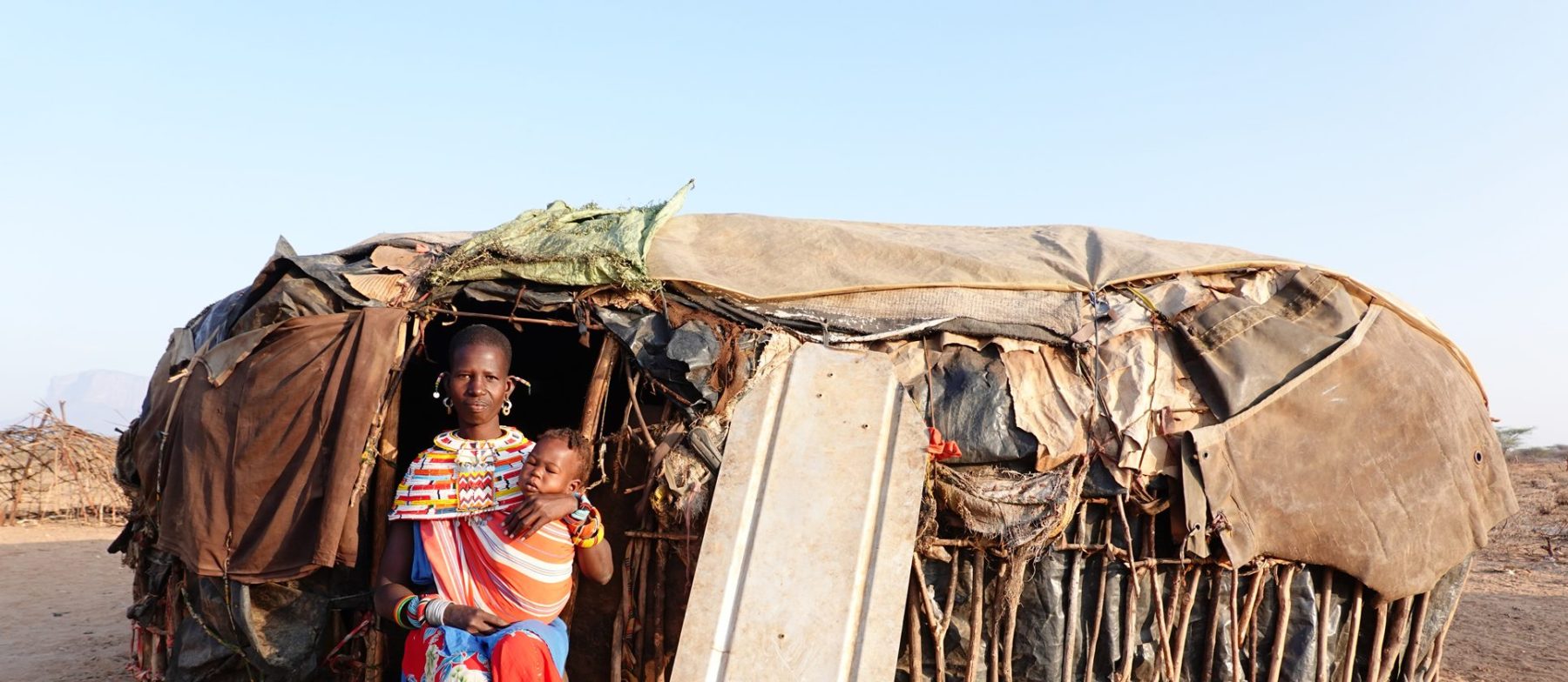 Mother and child at a traditional home
