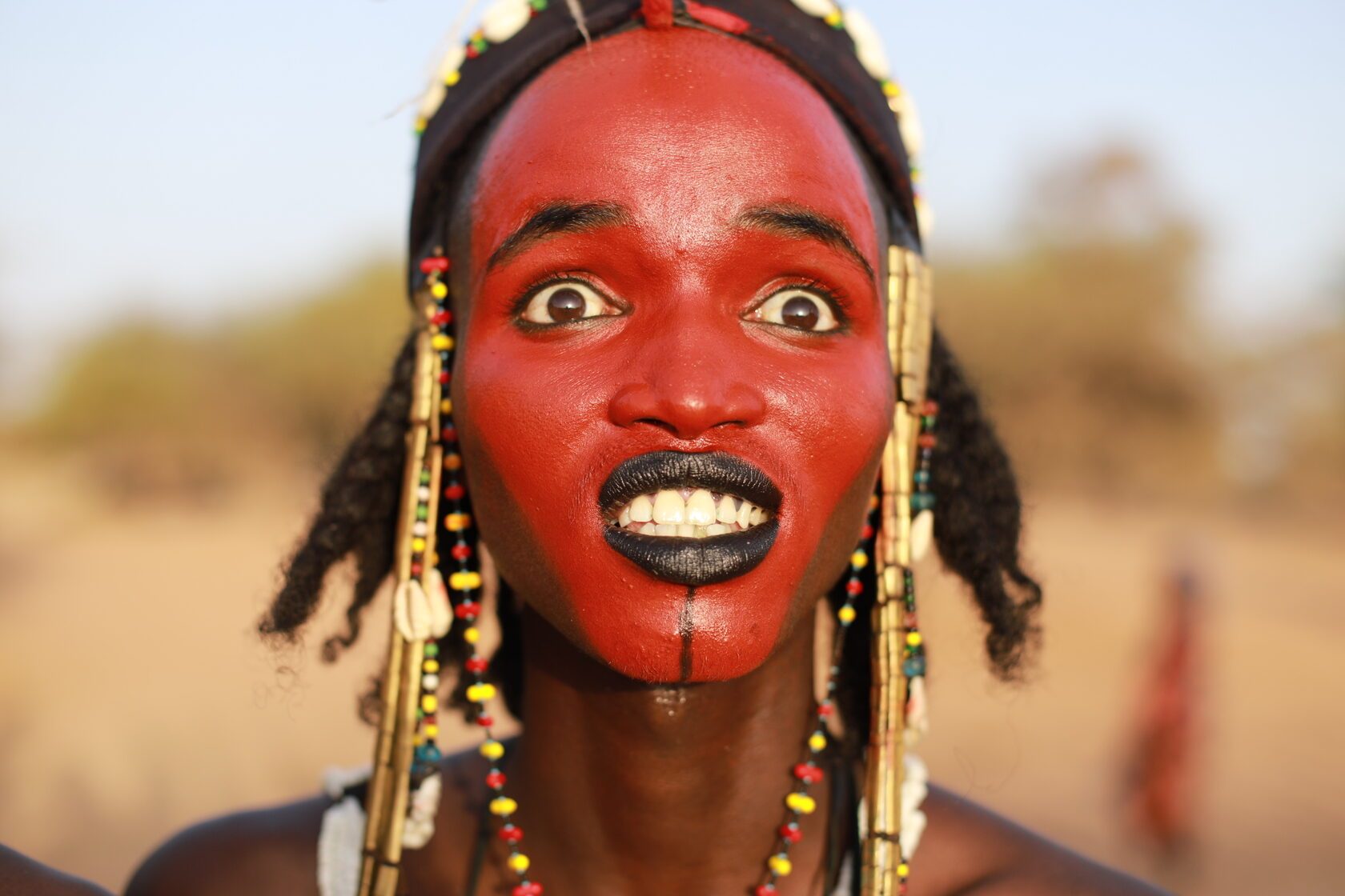 Festival participant with a painted face