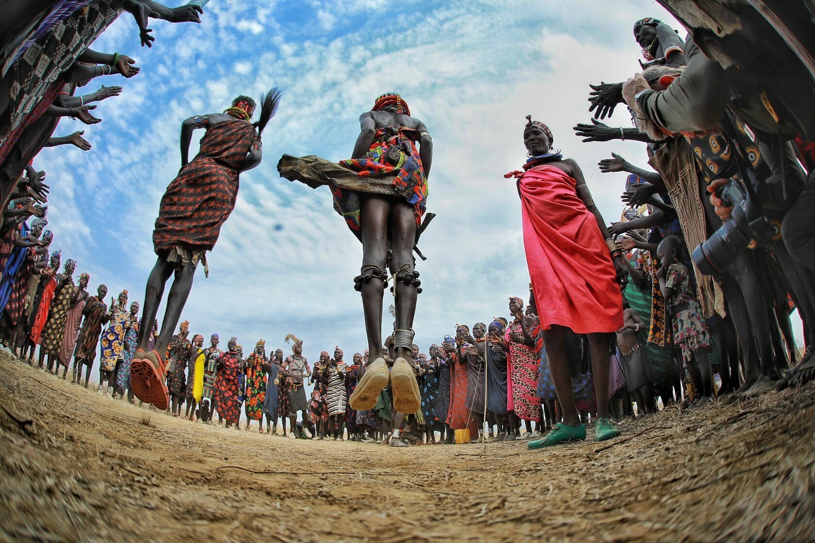 Villagers jumping in a traditional dance