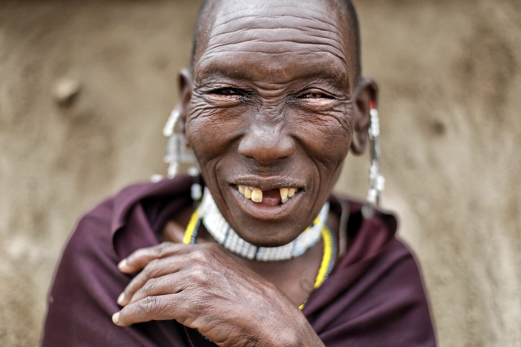 Smiling elder in traditional beads